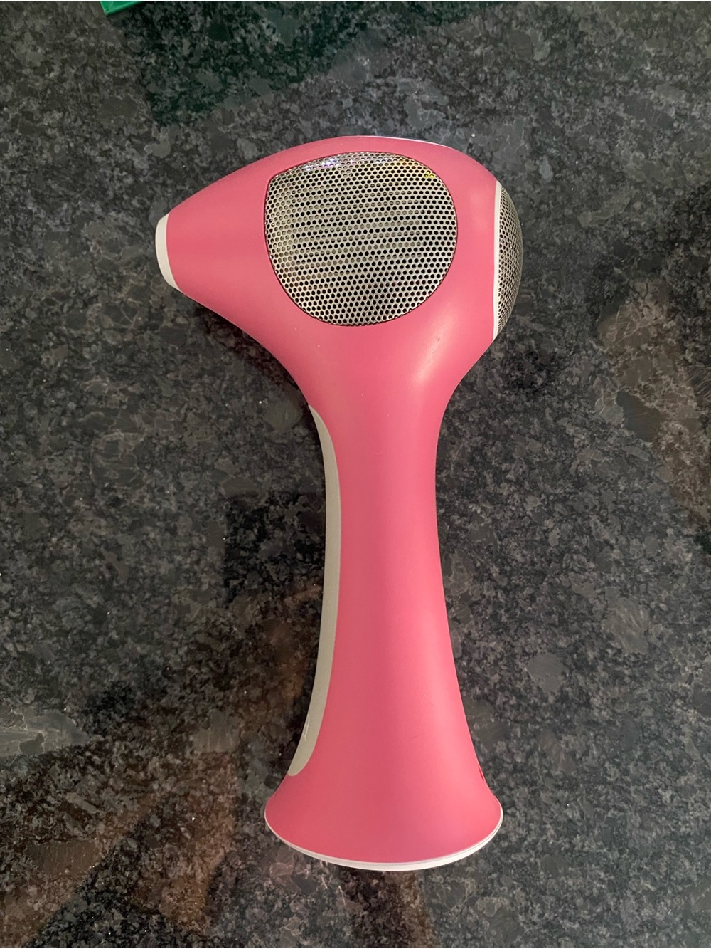 TRIA Beauty Pink Handheld Device with White Charger Adapter
